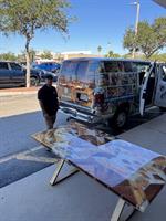 Gallery Image Kyle_with_table_and_van.jpg