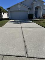 Detailed concrete cleaning service restoring curb appeal and improving the overall appearance of the property.