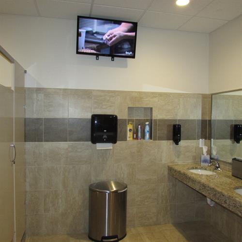 TV in all the restrooms, so you never miss a minute of the game.