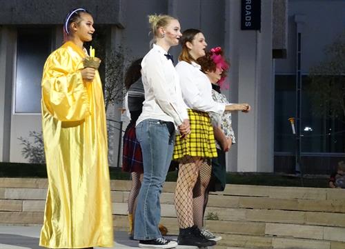 Actor Jade and Akasha Ingram, Kiersten Cussins, and Cassidy and Caroline Gaskins finalize their performance for the King during A Midsummer Nights Dream. Photo credits to Barbara Peterson