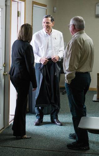 Executive Director, Amy Thomas talking with Senator Johb Barrasso