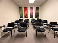 Classroom environment prepared for academic instruction, workshops, and educational activities.