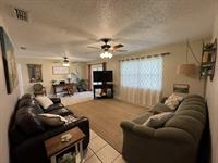 Living Room Features Two Comfy Couches - 1 of Which is a Queen Sofa Bed