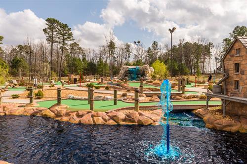 36 Holes of Mini Golf with water play for your balls!  Watch your ball be carried down the brook into the cup!