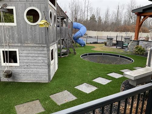 Backyard play area after foreverlawn academy 