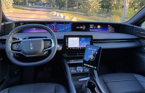 A luxury Lincoln interior featuring a full digital driver display, real-time navigation, and a professional trip-management setup — showcasing the diplomatic-grade, exclusive airport and corporate car service Wolff Premier Transportation provides across Northville and Metro Detroit.