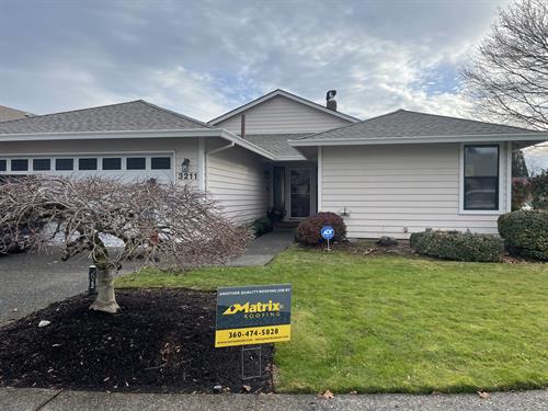 Happy Homeowners after their new roof
