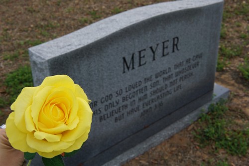 A custom granite monument, finished with a meaningful touch to honor remembrance and legacy.