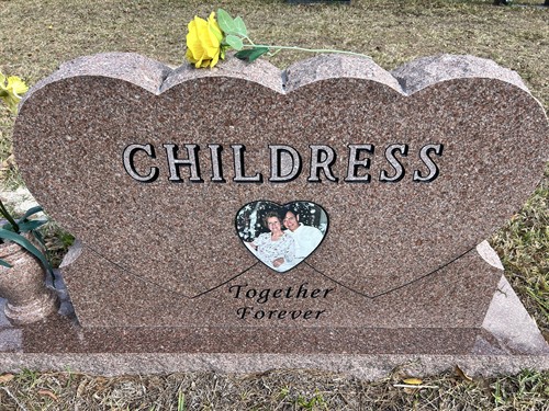 Custom granite monument featuring a unique shape and integrated photo, designed to honor a lasting connection.