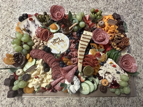 Charcuterie that doubles as a centerpiece. Perfect for parties, showers, open houses, and celebrations.