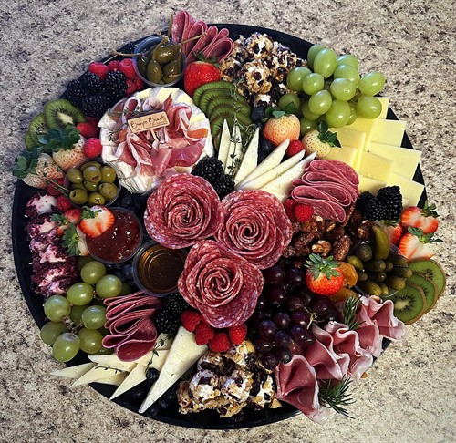 Boujee Boards by Justina creates custom spreads designed around your occasion, guest count, and style