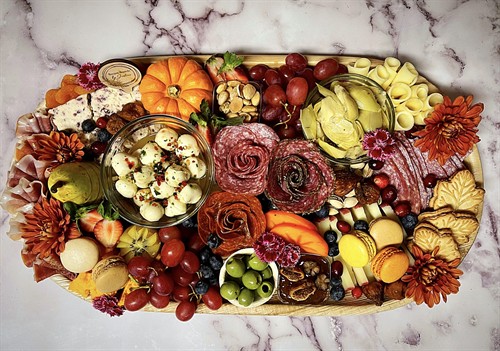 Charcuterie cups and boxes make it easy to serve something personal, polished, and party-ready.