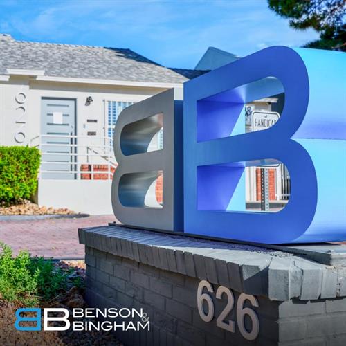 The Benson & Bingham logo stands out against the firm’s Las Vegas facade, representing trusted experience in personal injury and accident law.