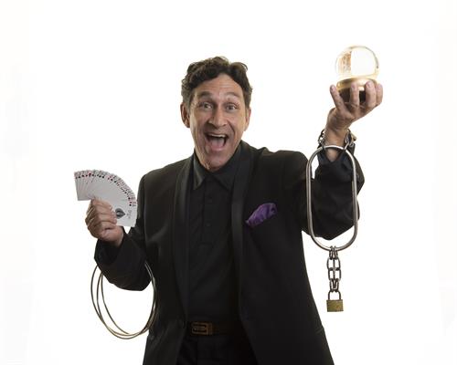Corporate closeup strolling magic, mentalism and stage shows for adults, kids, and families