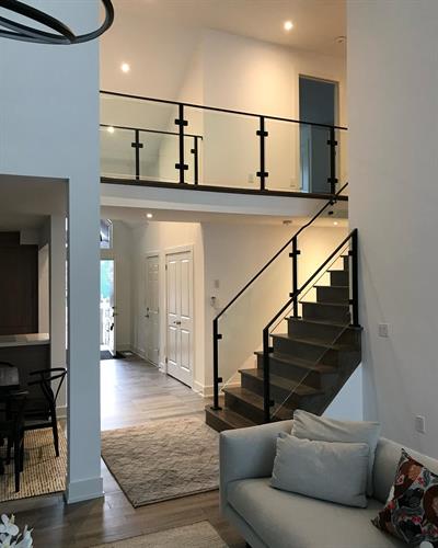Gallery Image Custom_Glass_Stringer_Stair_Railing_and_Double_Hall_Guard.jpg