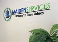 Company signage at the Maiden Office