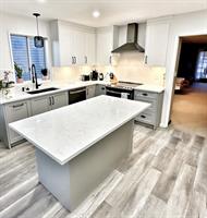 Grey kitchen, countertop and backsplash