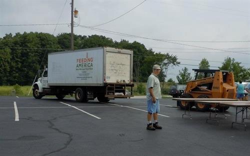 Monthly fresh food distribution to those in need. Monthly fresh food distribution to those in need.