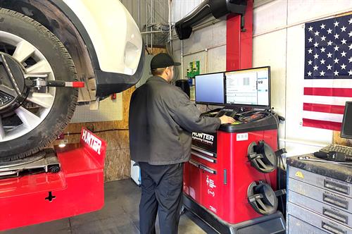 One of our service technicians using our state of the art Hunter Precision Alignment rack!
