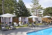 Oasis Outdoor Pool + Patio with Cabanas at Parkway Fitness & Racquet Club