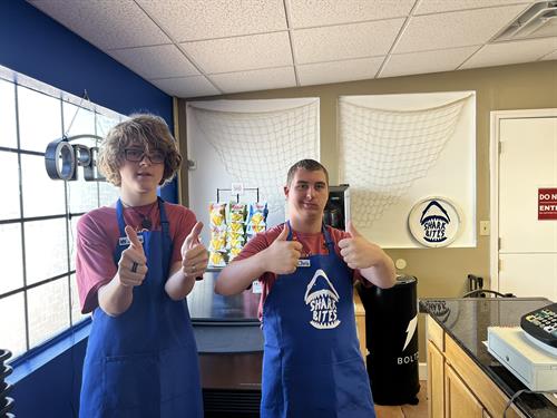 Shark Bites Café: real customer service moments, money skills, and big smiles.