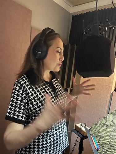 Nydia recording a commercial 