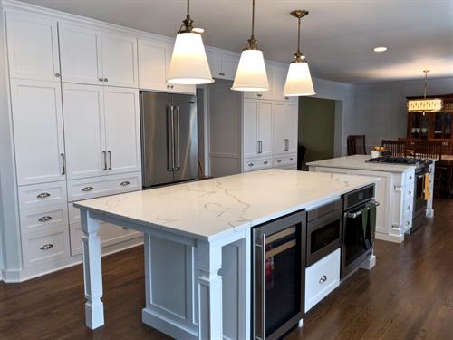 Full kitchen renovation, removing one wall which made room for two islands.