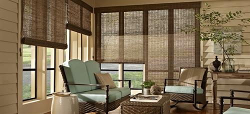 Woven wood or natural shades offer a great solution for filtering and softening the light.