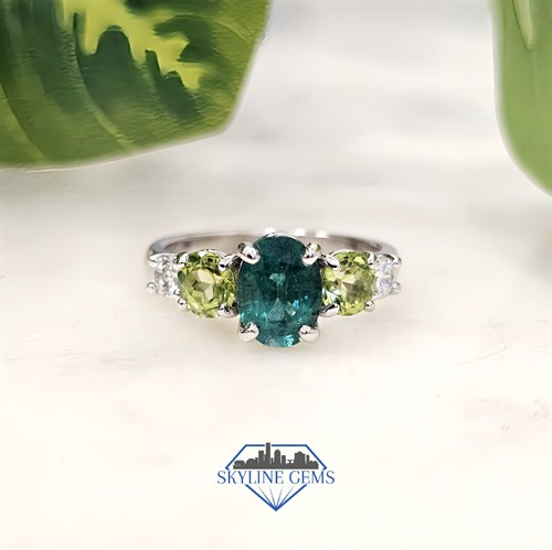 Custom Green-Themed Emerald and Peridot Engagement Ring