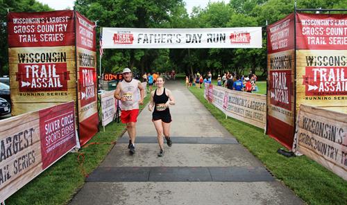 Gallery Image Fathers_day_father_and_daughter_at_finish_line.JPG