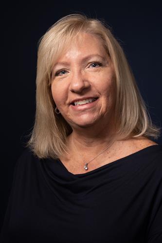 Gallery Image Kim_Wolf_Headshot(1).JPG