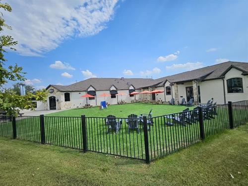 Little Elm outside turf patio