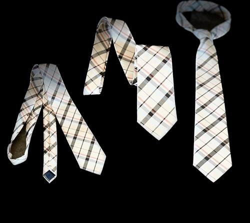 Fashionable tan necktie that can be worn to any event or for any occasion