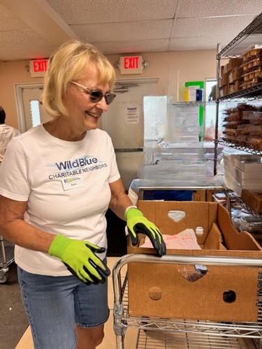 WildBlue Volunteer at our Pantry
