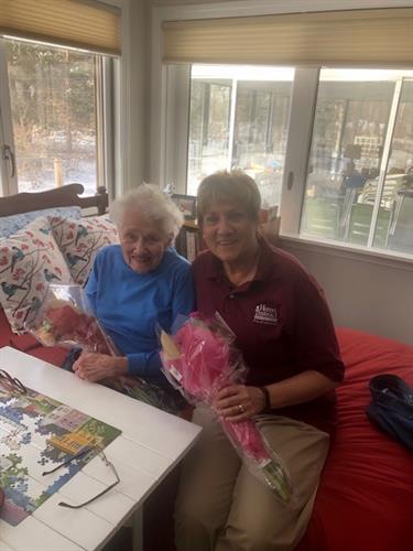 A pre-COVID-19 picture - one of our wonderful CAREGivers and her client.