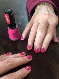 A spring-themed manicure for one of our clients given by her CAREGiver.