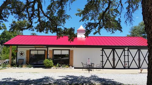 Snap Lock Metal Roof - Color is Deep Red by Austin Roofing and Construction