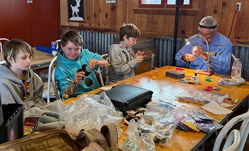 Bishop resident and guide Mark McKenzie teaching fly tying