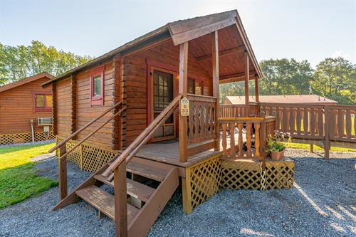 BAREBONES CABINS: Have a rustic camping feel with our barebones cabins, which can accommodate up to 6 guests. These pet-friendly cabins include a full size bed and two sets of bunk beds with heat and air conditioning, electric, a kitchenette, dresser, and a cable TV connection. 