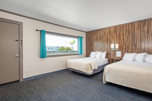 guest room with 2 full beds at the Beach Bum Inn