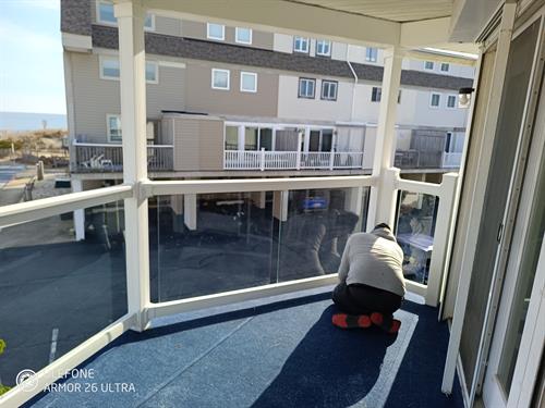 Project nearing completion with custom railings partially installed.