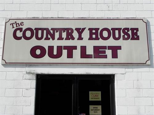 The Country House Outlet located right across the parking lot from the retail store.