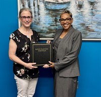 Client and Attorney Neonu Jewell at the Neon Edge Estate Planning Signing Ceremony