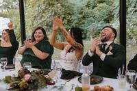 Wedding party during toasts in the garden pavilion Wedding party during toasts in the garden pavilion