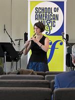 Jennet Ingle performing at Free Family Concert