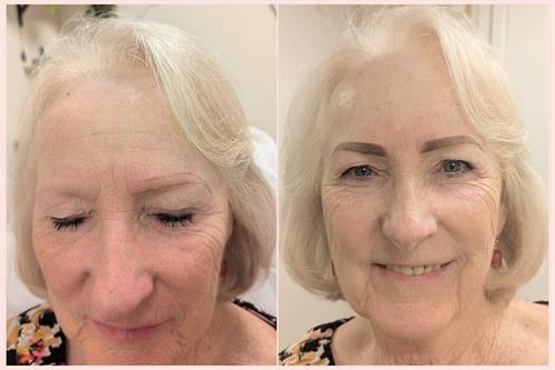 Beautiful mature woman showing how a Powder Brow Tattoo can bring youth and add gorgeous framing to an already beautiful canvas