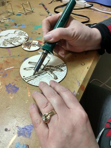 Pyrography is the art technique of drawing on wood by burning the surface. Inspired offers an introductory class to this unique art medium