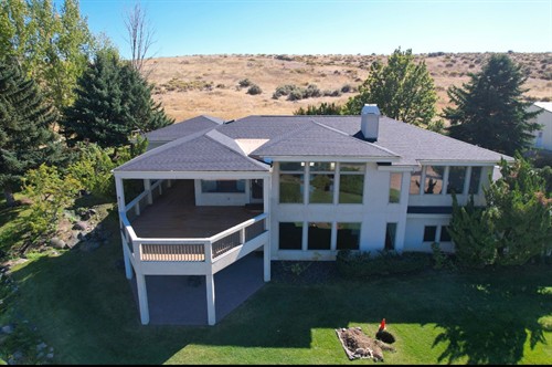 Back ariel view of home roof replacement 