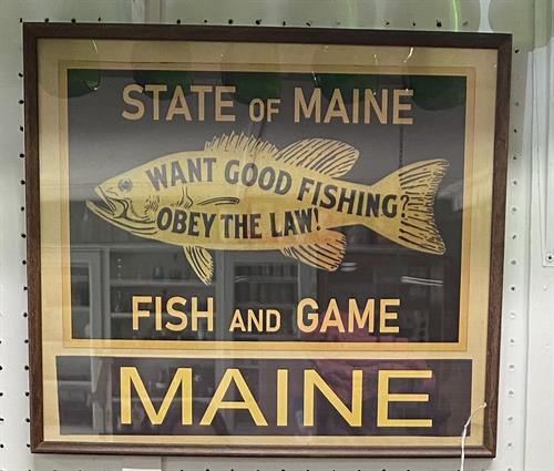 This is a fantastic piece! We bought several of these framed Maine game commission signs at auction during the summer of 2022.