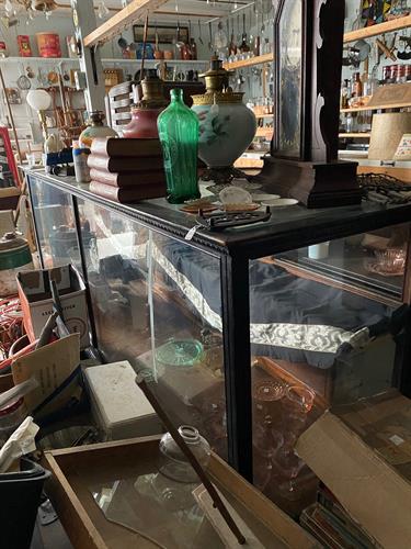 Inside, the building was filled to the gills. It had been an antique shop previously, so there was a lot of good stuff mixed in with bad and marginal stuff. We spent the winter of 2021 cleaning and organizing everything.